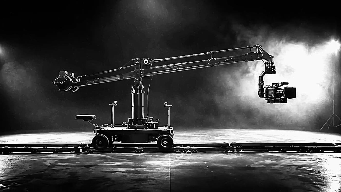 Camera crane and dolly on a stage.