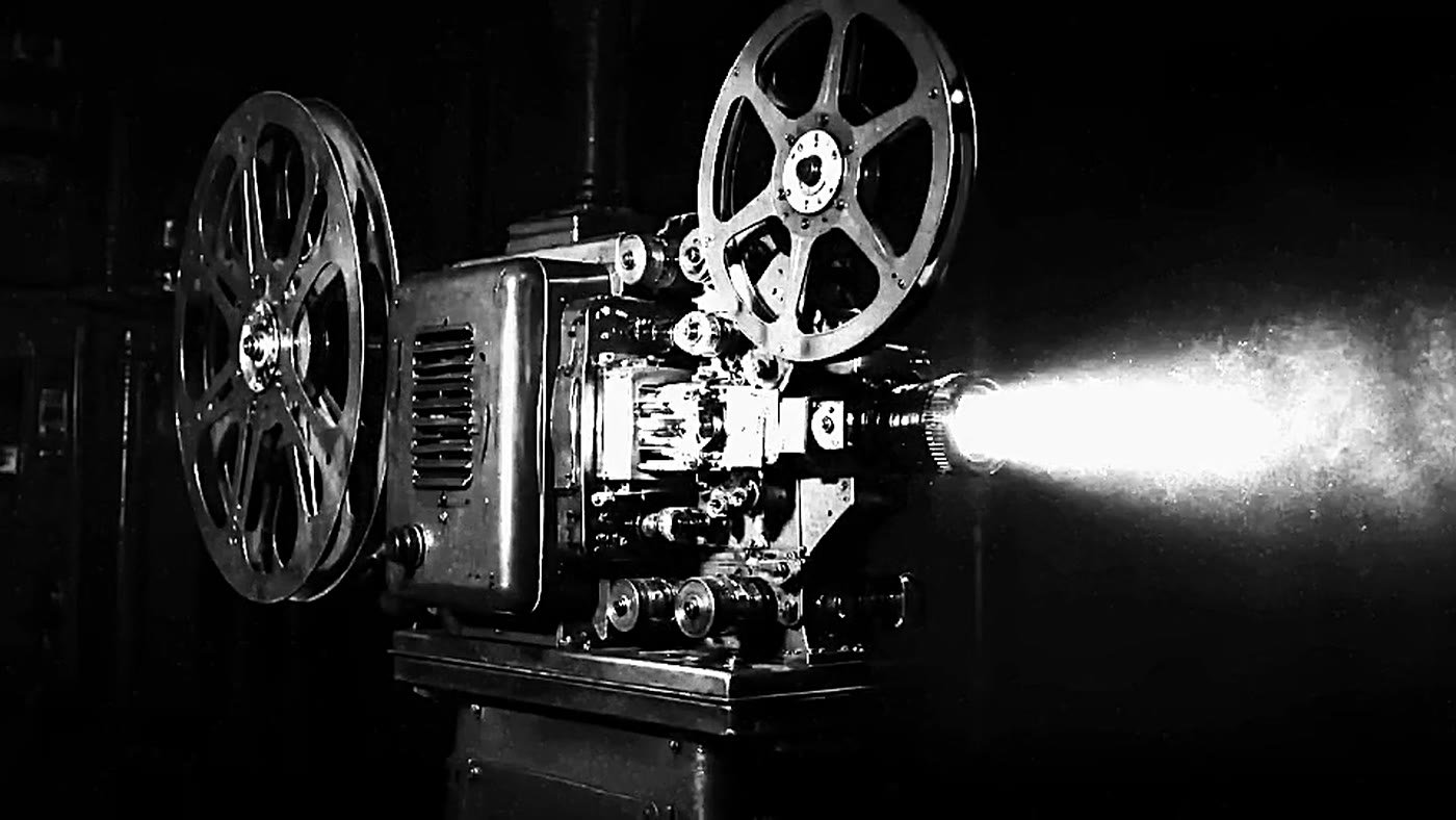 A film projector throwing a beam.